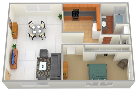A top down view of a living room with a couch, coffee table, and kitchen area.